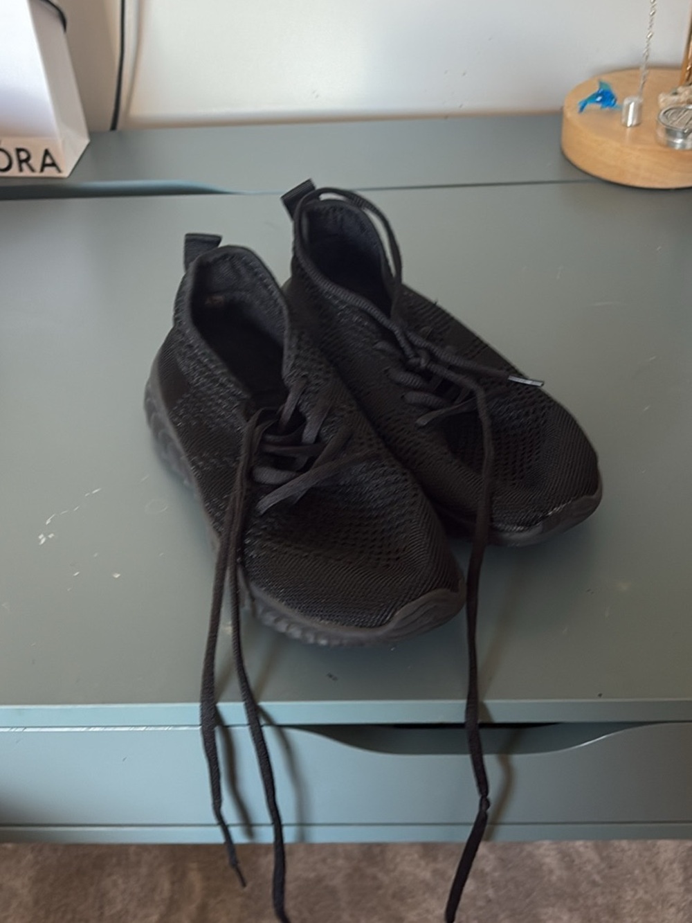 All-Black Knit Slip-On Sneakers
